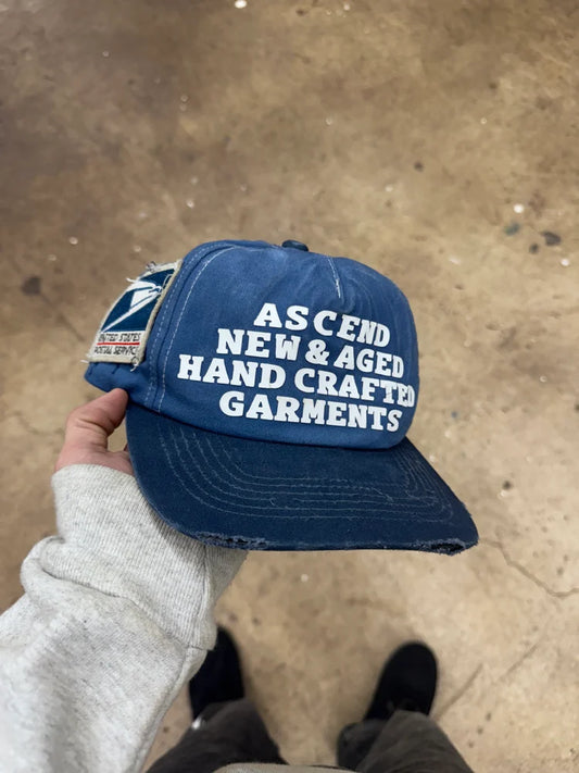 PERFECTLY AGED POSTAL SERVICE HAT